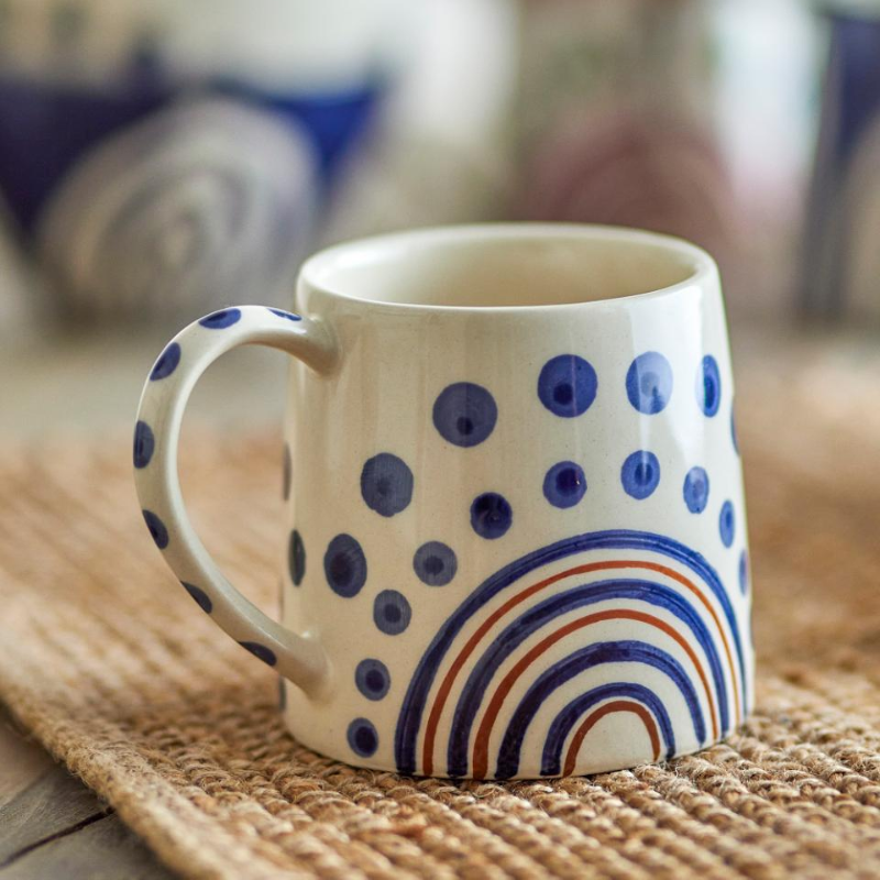 Mok met creatieve tekeningen oranje-blauw